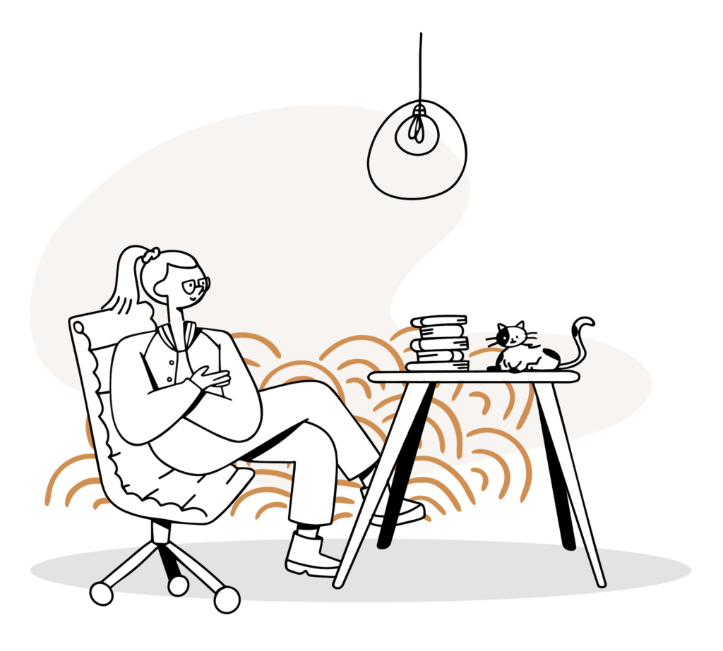 Girl Sitting at a desk with her cat